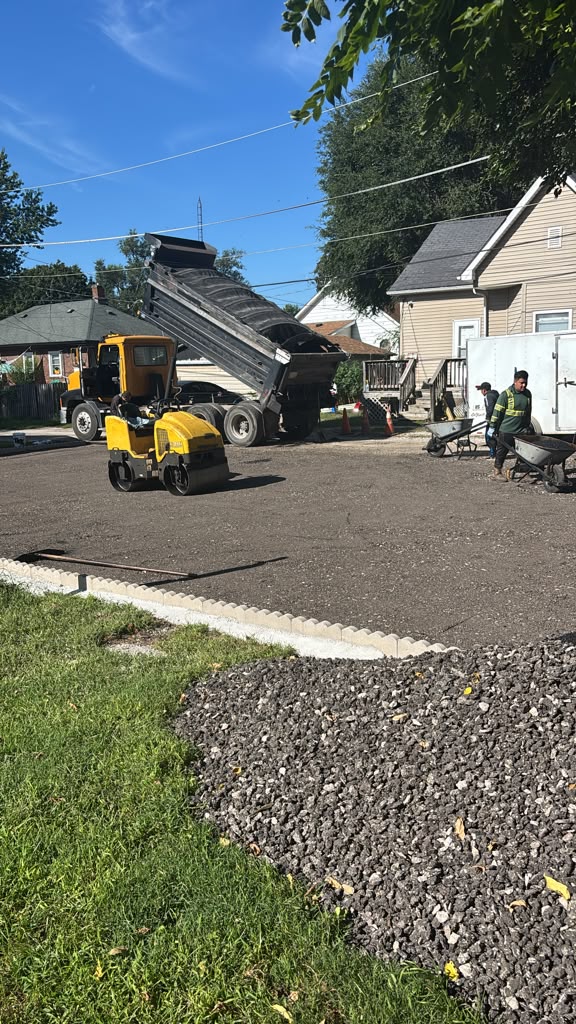 Dump Truck & Roller On Site